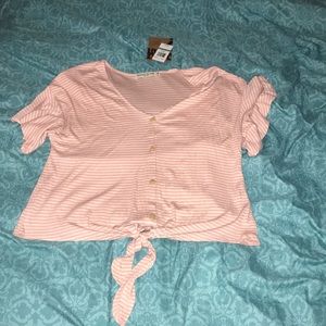 women’s white and pink shirt sleeve top